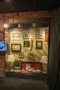 A glass case filled with Johnny Cash memorabilia at the Johnny Cash Museum in Nashville Tennessee