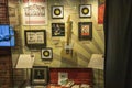 A glass case filled with Johnny Cash memorabilia at the Johnny Cash Museum in Nashville Tennessee