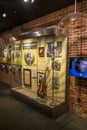 A glass case filled with Johnny Cash memorabilia at the Johnny Cash Museum in Nashville Tennessee