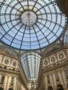 the glass ceiling of a shopping mall is above the atrium Royalty Free Stock Photo