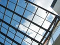 The blue sky through a glass ceiling Royalty Free Stock Photo