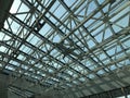 The glass ceiling of the modern building supports a steel beams grid Royalty Free Stock Photo