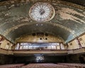 Glass ceiling and old chairs in the theater hall in the abandoned Irem Shrine in Pennsylvania, USA