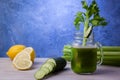 Cup with celery and cucumber juice, detox diet concept Royalty Free Stock Photo