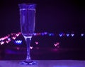 Glass of champagne on bokeh background