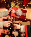 Glass of champagne. Champagne couple glasses. Giving gift. Cheers concept. New year tradition. Merry christmas. Alcohol Royalty Free Stock Photo
