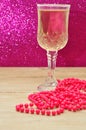 A glass of champagne displayed with a string of beads Royalty Free Stock Photo