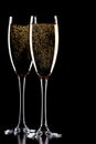 A glass of champagne, isolated on a black.