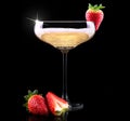 Glass of champagne with tasty strawberry Royalty Free Stock Photo