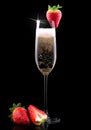 Glass of champagne with tasty strawberry Royalty Free Stock Photo