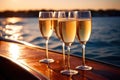 Glass of champagne on yacht in ocean, luxury lifestyle holiday travel