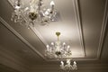 Glass chandelier. Ceiling light source Royalty Free Stock Photo