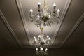 Glass chandelier. Ceiling light source Royalty Free Stock Photo