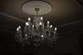 Glass chandelier. Ceiling light source Royalty Free Stock Photo