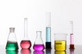 Glass in a chemical laboratory filled with colored liquid during Royalty Free Stock Photo