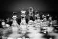 Glass chess game, king with queen, BW film Royalty Free Stock Photo