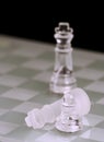 Glass chess king and pawn Royalty Free Stock Photo