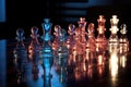 glass chess pieces reflecting light on board Royalty Free Stock Photo