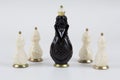 Glass chess pieces on a white background
