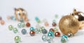 Glass and Christmas balls on a white background Royalty Free Stock Photo