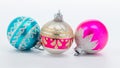 Three Christmass balls of different patterns and colors Royalty Free Stock Photo