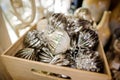 Glass Christmas tree decoration toys in the form of silver balls in a wooden box Royalty Free Stock Photo