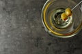 Glass of Classic Dry  with olives on grey table, top view. Space for text Royalty Free Stock Photo