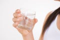 A glass of clean mineral water in woman`s hands Royalty Free Stock Photo