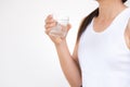 A glass of clean mineral water in woman`s hands. i Royalty Free Stock Photo