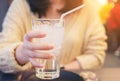 A glass of clean mineral water in woman`s hands. Concept of environment protection, healthy drink, glass of fresh Water Royalty Free Stock Photo