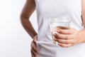 A glass of clean mineral water in woman`s hands. Concept of environment protection, healthy drink and healthcare Royalty Free Stock Photo