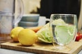 Glass of clean water and vegetables Royalty Free Stock Photo