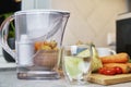 Glass of clean water and vegetables Royalty Free Stock Photo