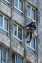 Glass cleaner working on a building