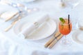Glass with a cocktail on the decorated table in the restaurant Royalty Free Stock Photo