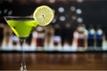 Martini cocktail in glass on blurred background Royalty Free Stock Photo