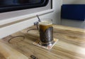A glass of coffee in the carriage