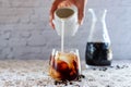 Cold brew coffee with milk in glasses Royalty Free Stock Photo