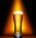 Glass of cold craft light beer on dark background. Royalty Free Stock Photo
