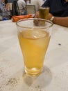 A Glass of cold fresh lager beer on a wooden bar counter in pub Royalty Free Stock Photo