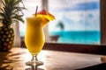 Glass of cold fresh summer cocktail on wooden table with ocean view on background Royalty Free Stock Photo