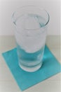 Glass of Cold Ice Water on a Napkin Isolated