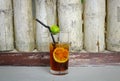 Glass of cold iced tea with sliced lemons Royalty Free Stock Photo