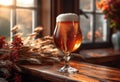 Glass of cold light beer with foam on the wooden bar counter in pub Royalty Free Stock Photo