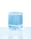 Glass of cold sparkling water with drops Royalty Free Stock Photo