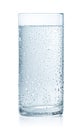 Glass of cold still water with drops Royalty Free Stock Photo