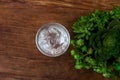 Glass of Cold Water with Ice on Wooden table, Top view, Green Le Royalty Free Stock Photo