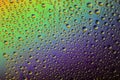 Water drops on the glass, rainbow effect