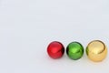 Glass color spheres lying in snow Royalty Free Stock Photo
