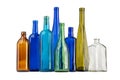 A row of empty glass wine bottles, different colors on a white background Royalty Free Stock Photo